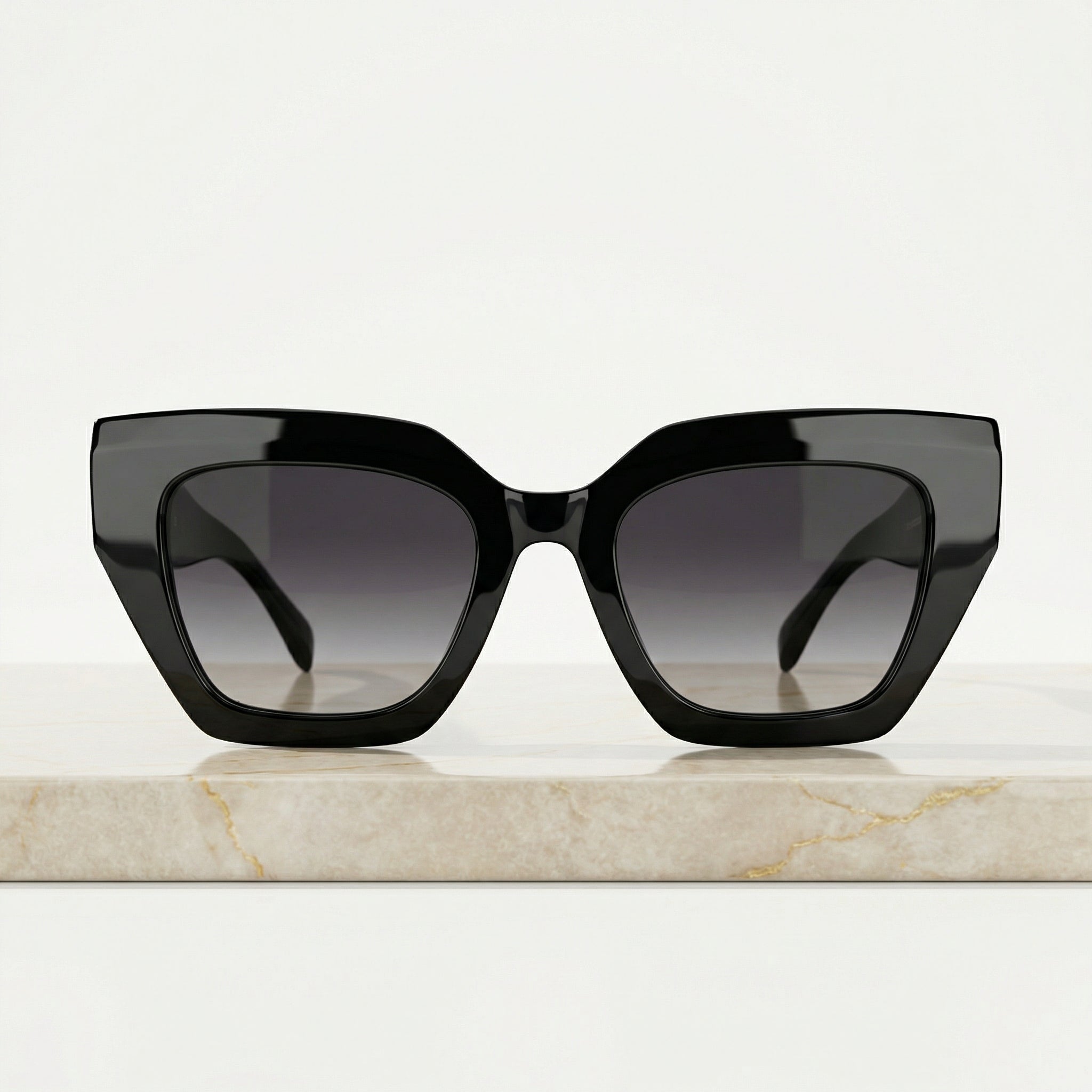 TOUS Negras Oversize con Detalle Floral Dorado